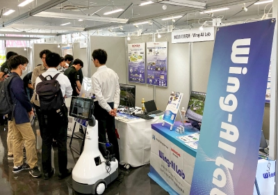 2024年9月3日（火）～6日（金）「第42回日本ロボット学会学術講演会（RSJ2024）」にてWing-AI Labの紹介を行いました。